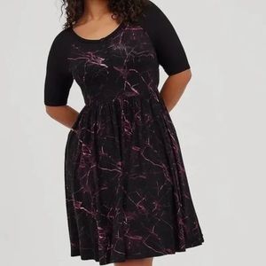 Marbled black skater dress.